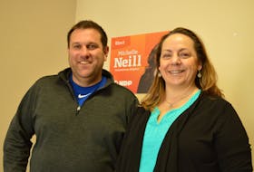 Mat Whynott, left, campaign manager for the P.E.I. NDP, and Michelle Neill, leader, present the party's health-care promises during a news conference March 8 in Charlottetown.