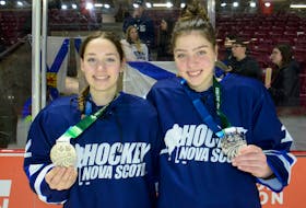 Sarah Leopold, left, and Ava Shearer won silver medals with Nova Scotia’s hockey team at the Canada Games in Summerside, P.E.I., on March 5.  
Jason Malloy