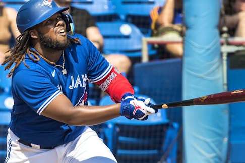 Toronto Blue Jays' Vladimir Guerrero Jr. watches ball hit to the warning track but caught for an out in the third inning of their spring training game against the Pittsburgh Pirates in Dunedin, Fla., Thursday, March 2, 2023.
