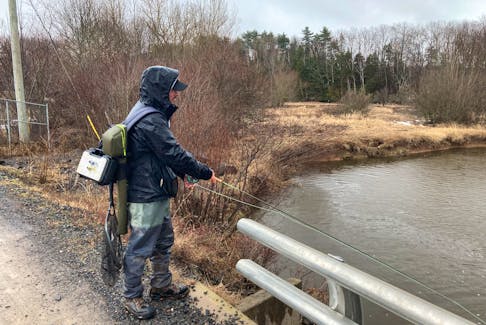Lucas Rawlins of Hantsport was in search on brown trout on the opening day of the sportfishing season Saturday. - Staff