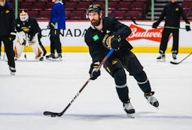Defenceman Filip Hronek practising with his new Vancouver Canucks teammates on March 21, 2023. He hurt his shoulder with the Detroit Red Wings before being traded to Vancouver.