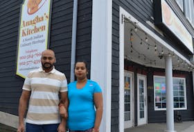 Asish and Blessy Joy are shown out front of Anagha's Kitchen on Charlotte Street, Sydney, a restaurant they started together a year ago. They’ve made it through a year of construction and a post-tropical storm and are highly anticipating a productive year ahead. GREG MCNEIL/CAPE BRETON POST