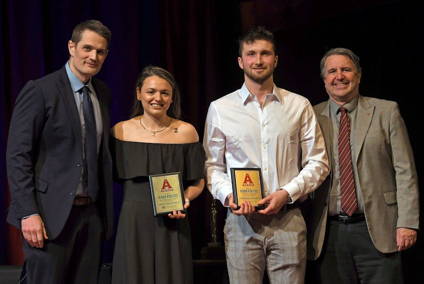 Haley McDonald and Gordon Shortt are this year’s Acadia University varsity athletes of the year. The awards were recently presented in Wolfville. From left are director of athletics Brian Finniss, McDonald, Shortt and vice-president of administration Chris Callbeck.
Peter Oleskevich • Acadia Athletics