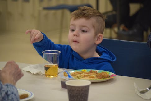 Two-and-a-half-year-old Levi Hiltz, from Lower Sackville, was quite animated as he enjoyed his pancakes and sausages.