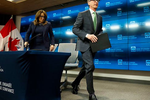 Bank of Canada governor Tiff Macklem and senior deputy governor Carolyn Rogers leave a news conference after announcing an interest rate decision in Ottawa on April 12, 2023.