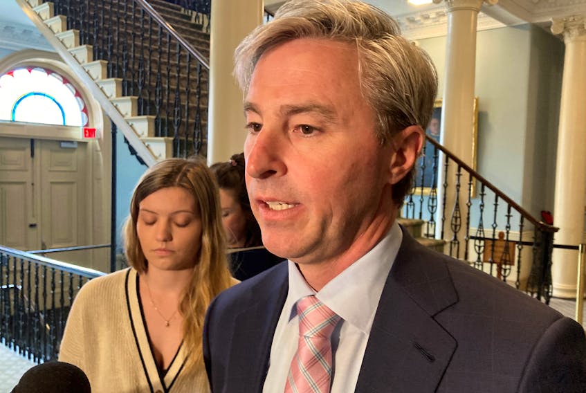 Premier Tim Houston, speaking at Province House in Halifax on Wednesday, April 12, 2023, defended the short legislature session by saying it sits as long as is necessary to get the people's work done. - Francis Campbell