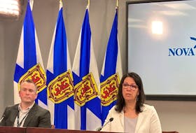 Health Minister Michelle Thompson and Steven Carrigan, director of analytics quality and system performance with the Nova Scotia health department, take part in a news conference in Halifax on Friday, April 14, 2023. - Francis Campbell