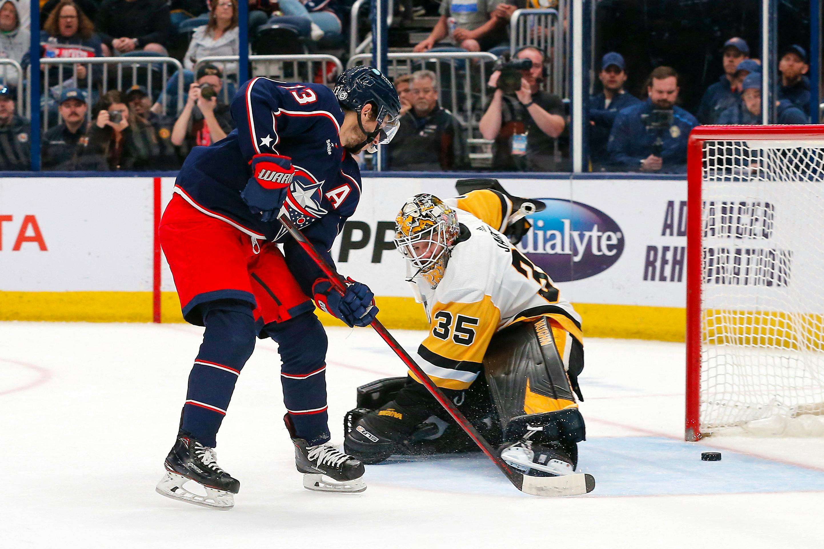 DeBrusk scores pair in final frame to lift Bruins past Penguins in