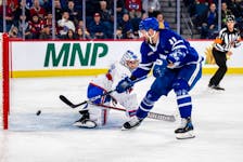 Toronto Marlies captain Logan Shaw of Glace Bay, right, was named the winner of the Fred T. Hunt Memorial Award as the player who best exemplifies the qualities of sportsmanship, determination and dedication to hockey in the American Hockey League. PHOTO/TORONTO MARLIES, AHL.