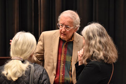 J.J. Steinfeld chats with some people after the Yom HaShoah Commemoration of the Holocaust April 16 in Charlottetown. Alison Jenkins • The Guardian