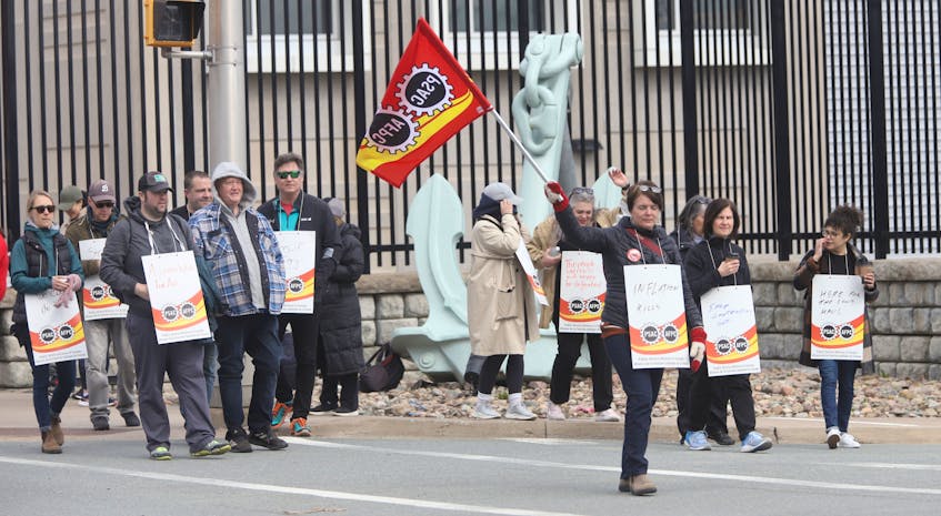 PSAC workers striking in front of CFB Stadacona  in Halifax on Wednesday, April 19, 2023.