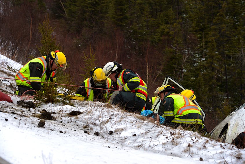 One woman was taken to hospital after her car crashed over a guardrail and narrowly avoided plunging over a steep embankment in C.B.S. Sunday morning. Saltwire Network staff