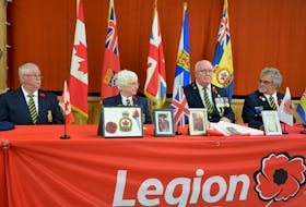 Royal Canadian Legion Ortona Branch 69 president Gilbert Kendall, member Ruby Lawrence, immediate past president Peter Rigby and first vice president Peter Martin at an April 12 ceremony where it was announced that the rightful owner of a First World War Memorial Cross medal has been found. KIRK STARRATT
