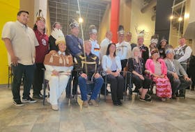 A group photo of Indigenous Services Minister Patty Hajdu, provincial Health Minister Michelle Thompson (middle) and the Mi'kmaq chiefs from across Nova Scotia.