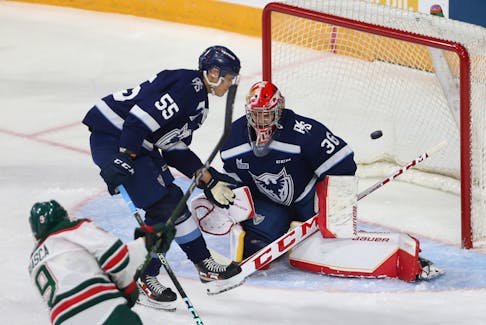 Halifax Mooseheads Attliio Biasca scores on a one timer past Sherbooke Phoenix Tyson Hinds and goalie Olivier Adam during QMHL action in Halifax Saturday January 14, 2022.

TIM KROCHAK PHOTO