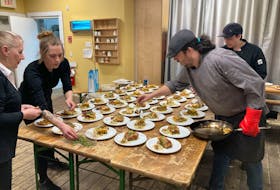 Chef Domenic Padula of Food Fantastique near Windsor adds the final touch to a dish prepared last week for an inspired local menu. It was served up at the Wolfville Farmers’ Market.
WENDY ELLIOTT