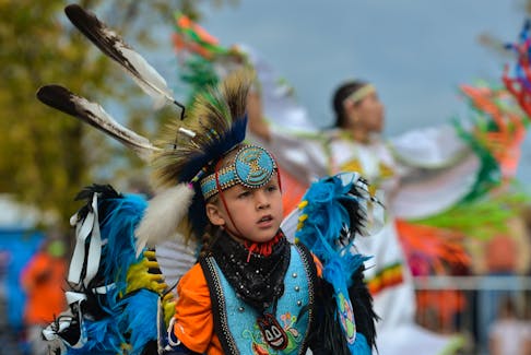Young members of the First Nations performs an Indigenous dance as the City of Calgary commemorates Orange Shirt Day and observes the first National Day for Truth and Reconciliation — now a federal statutory holiday — with an outdoor official ceremony at Fort Calgary on Sept. 30, 2021. Artur Widak/NurPhoto