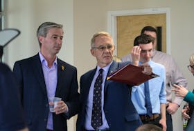 Acadia University president Peter Ricketts, right, speaks with Nova Scotia Premier Tim Houston May 11 before they announced a new nursing program for the Wolfville university.
Jason Malloy
