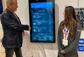 EV chargers with energy management capabilities offer energy savings and convenience. Mike Holmes with Rebecca from EATON at IBS trade show earlier this year. 
