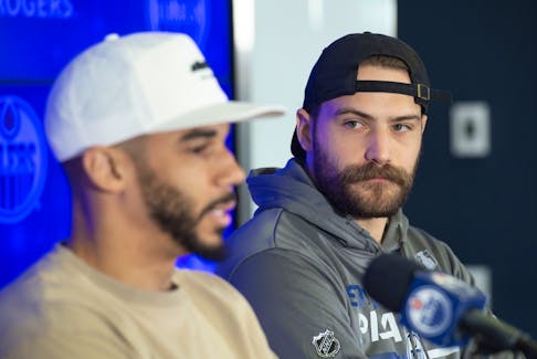 Evander Kane , left, and goalie Stuart Skinner of the Edmonton Oilers, speak with media at Rogers Place in Edmonton on Tuesday, May 16, 2023.
