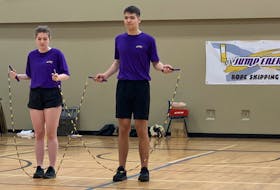 Jacob Nussey, right, and Delia Miles compete in wheel freestyle competitive skipping during the Nova Scotia provincial jump rope championships at Cole Harbour High School on March 25. Colin Hodd