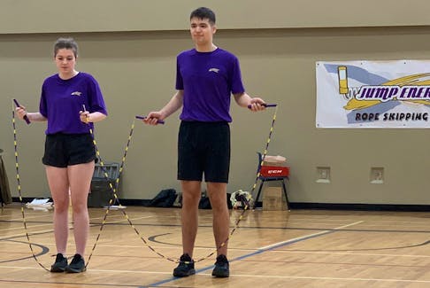 Jacob Nussey, right, and Delia Miles compete in wheel freestyle competitive skipping during the Nova Scotia provincial jump rope championships at Cole Harbour High School on March 25. Colin Hodd