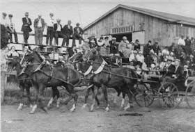 A crowd watching 4 horses hitched to wagon at the Hants County Exhibition, September 1930. Photographer unknown. Courtesy of the West Hants Historical Society.
