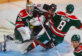 Quebec Remparts left wing Zachary Bolduc crashes into Halifax Mooseheads goalie Mathis Rousseau during the second period of QMJHL finals action in Halifax on Wednesday, May 17, 2023.
Ryan Taplin - The Chronicle Herald