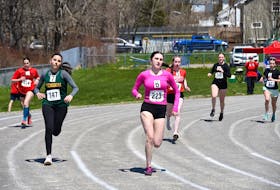Ella Bottomley of Riverview High School, middle, leads the way in the 800-metre senior girls race during the Cape Breton-Victoria District Track and Field Championships at Atlantic Street Field in Sydney on May 11. The Sydney product won the race with a time of 2:26.92. CONTRIBUTED/OWEN FITZGERALD