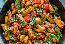 Green Mango also serve this spicy basil chicken dish with beef. — greenmangonl.com