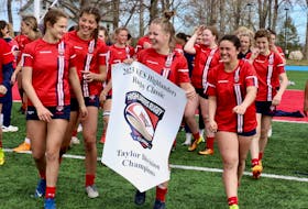 King’s-Edgehill School’s girls’ team went undefeated at the 2023 Highlanders’ Rugby Classic, bringing home the banner for the second year. Pictured celebrating following the championship final are, from left, Clare Munro, Ava Shearer, Hanna MacGregor, and Rafaela Blanco.