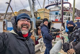Wendell Collier, left, the director and executive producer of East Harbour Heroes, said he hopes the show can highlight the hard-working people who keep the harbour going. - Courtesy of Bell Media
