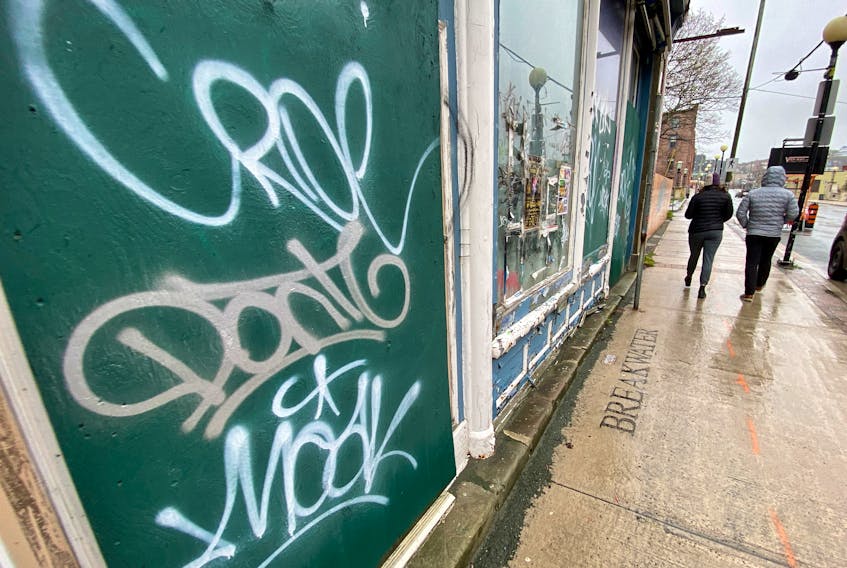 Graffiti on a vacant business building on Water Street in downtown St. John’s. Property owners are constantly dealing with damage from graffiti and the RNC has made a number of recent arrests. — Keith Gosse/The Telegram