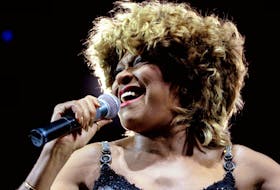 Tina Turner performs on stage of the Kremlin Palace of Congresses, in Moscow on Nov. 5, 1996. - Reuters