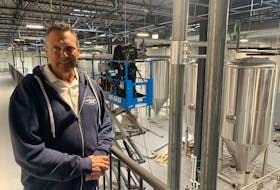 Nine Locks Brewing co-founder Danny O'Hearn in the company's new facility in Dartmouth, next door to the old one.