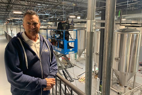 Nine Locks Brewing co-founder Danny O'Hearn in the company's new facility in Dartmouth, next door to the old one.