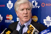  Former Toronto Maple Leafs GM Brian Burke speaks to the media in 2010.