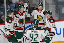 Halifax Mooseheads Alexandre Doucet is all smiles (top) as he celebratrs his goal with teammates against the  Sherbooke Phoenix during QMHL action in Halifax Saturday January 14, 2022.

TIM KROCHAK PHOTO