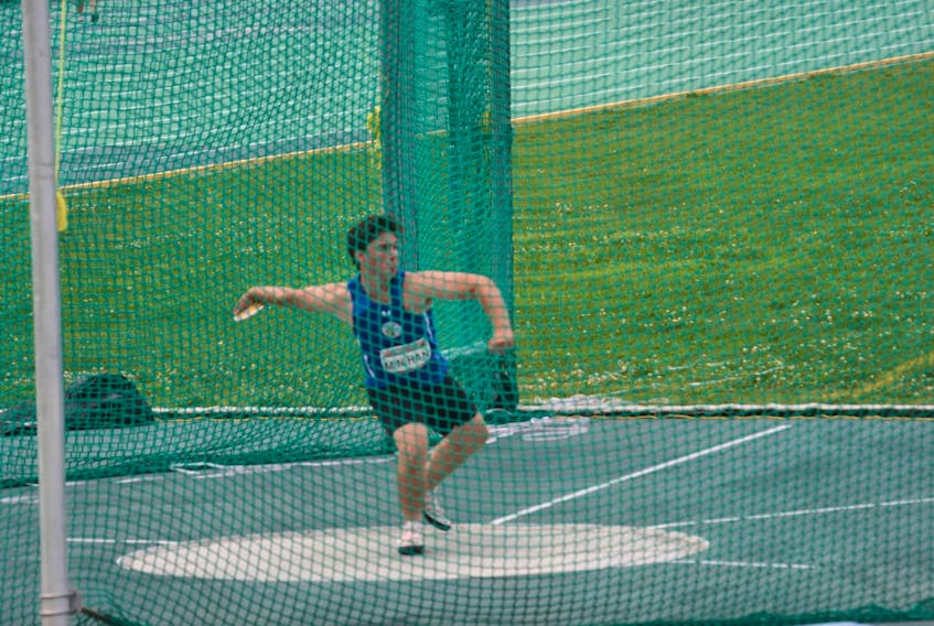 Owen Minihan prepares to take part in the discus event at a recent track and field competition. The Sydney product will look to secure his spot in the School Sport Nova Scotia Track and Field provincial championship when he takes part in the Highland Region track and field championship this weekend in Sydney. CONTRIBUTED/OWEN MINIHAN