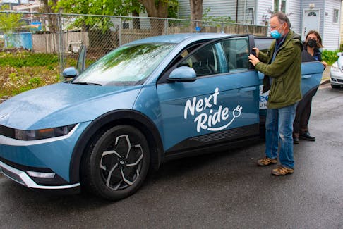 Tim Whynot gets out of a Hyundai Ioniq after taking it for a spin during an electric vehicle event outside the Ecology Action Centre offices in Halifax on Thursday, May 25, 2023. 
Ryan Taplin - The Chronicle Herald