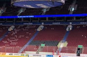  New black seats are being installed between the team benches at Rogers Arena.