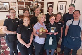 The team at Longfellow Restaurant were excited to receive the People’s Choice Award for Burger Wars 2023. Front row, from left, Hannah Rushton, Teresa Brown, Jessica Jordan, Tim Llorera. Second row, Kayla Casey, Tyreen Kapoor, Samar Nagiar, Will Mercer, Shyanne Murray and Destin Daisley.  
Contributed photos