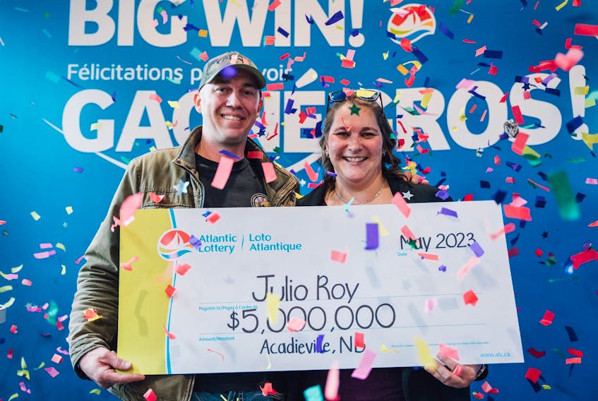 Julio Roy, left, and his wife Sacha Gaudet are thrilled Roy will be able to spend more time at home after winning $5 million. - Contributed