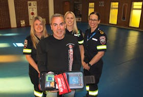 Steve Nickerson purchased an automated external defibrillator (AED) for East Coast Aikido in Greenwood after he had a heart attack in January. He had a chance on May 24 to thank the paramedics who saved him as part of Paramedic Services Week. From left are Brittany Cunningham, Nickerson, Amanda MacIntosh and Jenny Haynes.
Jason Malloy