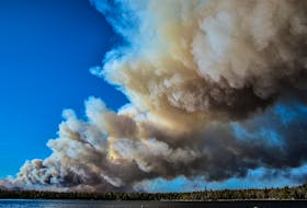 Thick smoke billowed from a wildfire in Barrington on May 27. The fire is in the Barrington Lake/Goose Lake area and was burning out of control. FRANKIE CROWELL PHOTO