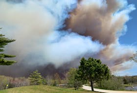 Smoke billowing over Clyde River as seen from the River Hills Golf Course on Sunday, May 28. KATHY JOHNSON PHOTO
