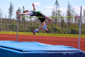 Blake Marchand from SAREC (Strait Area Education Recreation Centre) clears the pole in one of his jumps during the senior boys high jump event at the SSNS Highland Region Track and Field Championships on Saturday in Sydney. Held at the Cape Breton Health and Recreation Complex at Cape Breton University, Marchand came first in the event with a final score of 1.95 metres. NICOLE SULLIVAN/CAPE BRETON POST