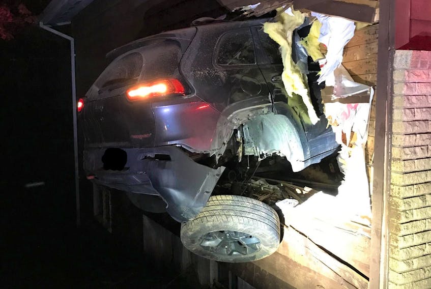 No-one was physically injured after a woman drove her Jeep Cherokee into a Fall RIver home on Sunday morning.