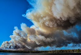 Thick smoke billowed from a wildfire in Barrington on May 27. The wildfire is in the Barrington region has been burning out control for days and by May 29 had burned over 6,270 hectares. FRANKIE CROWELL PHOTO - Contributed