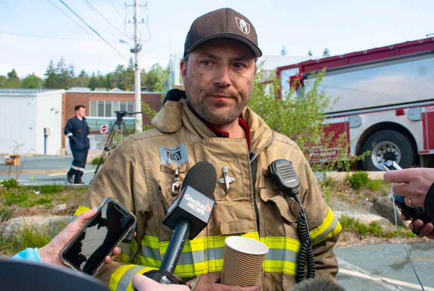 Brett Tetanish, captain with the Brooklyn Volunteer Fire Department, speaks tor reporters on May 29, 2023 at the St. Margaret's Centre after a long shift battling a wildfire in Upper Tantallon.